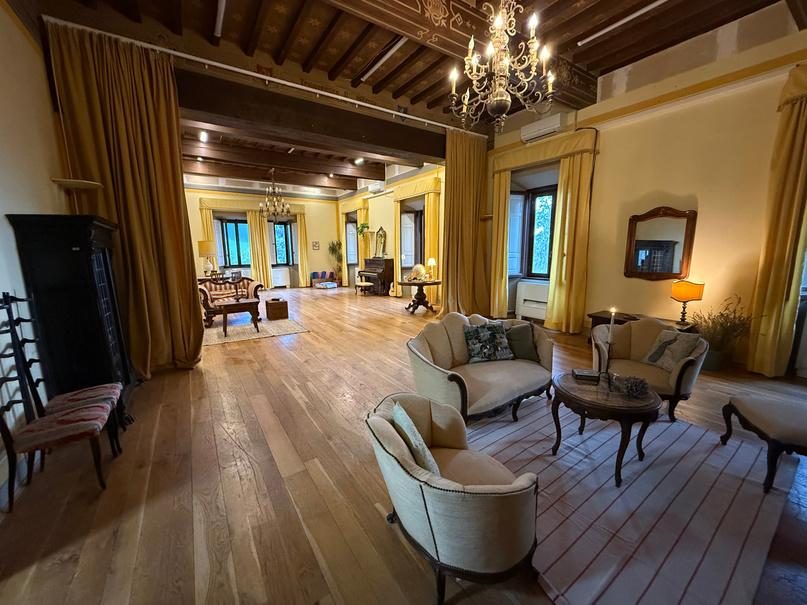The Ballroom: a long hall with wooden floors and chandeliers